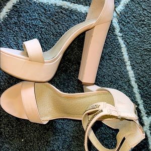 Nude open toe pumps